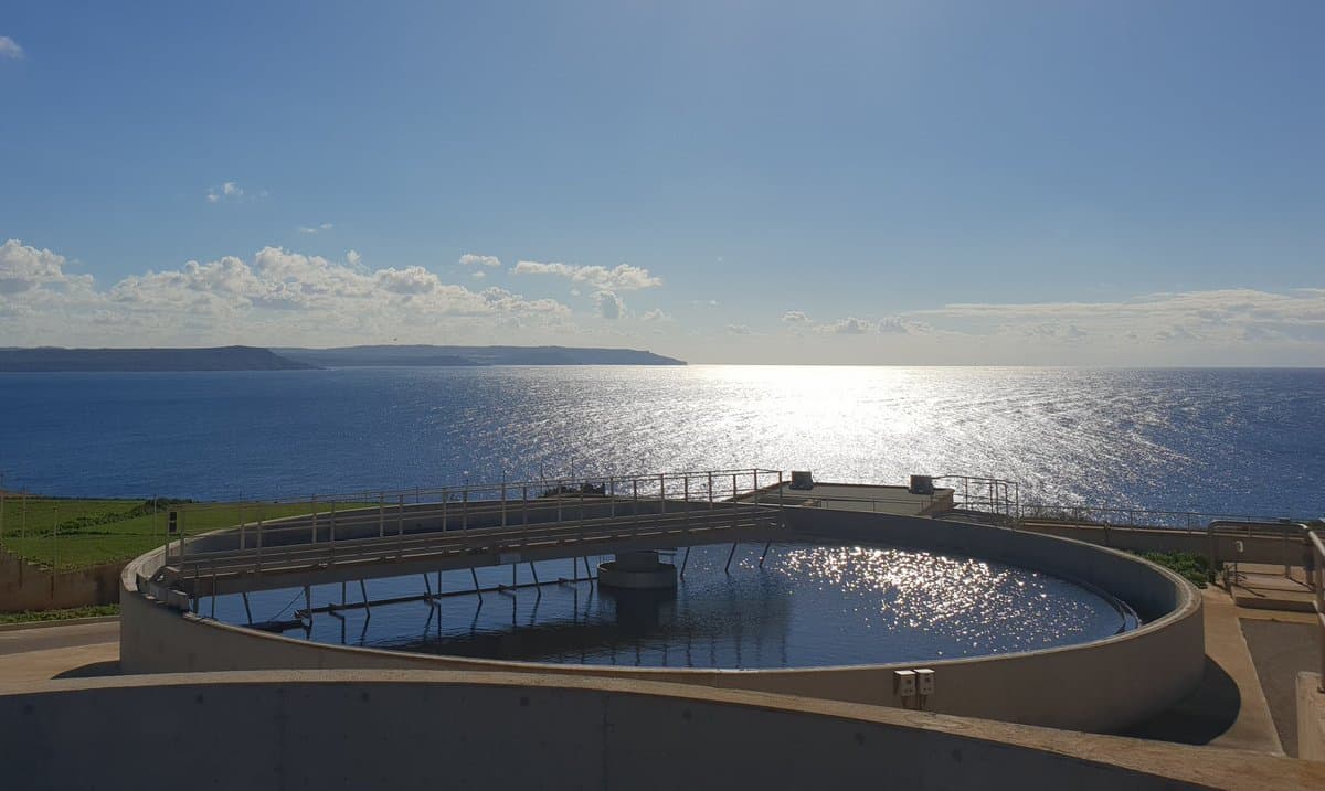 Circular water reservoir with sea view